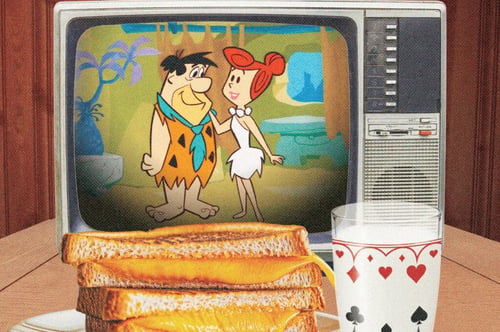 Concours Gagnez une copie du livre Un dîner avec les Pierrafeu : La petite histoire d’une adaptation québécoise!